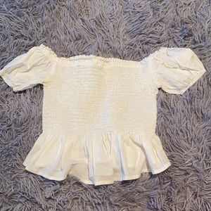 White cropped off shoulder shirt!